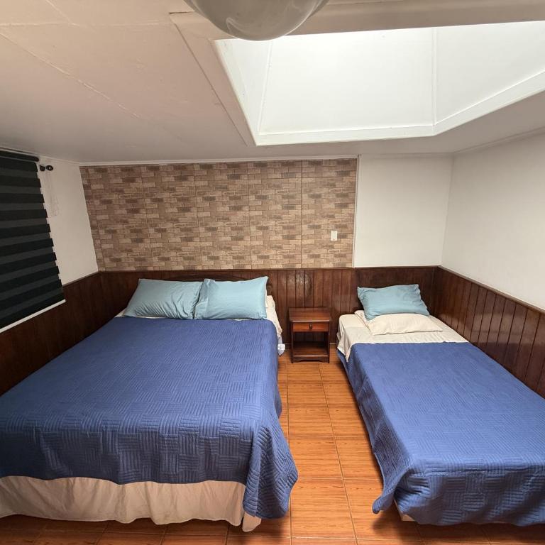 Hostal Vaihere - Triple Room with Private Bathroom - 18