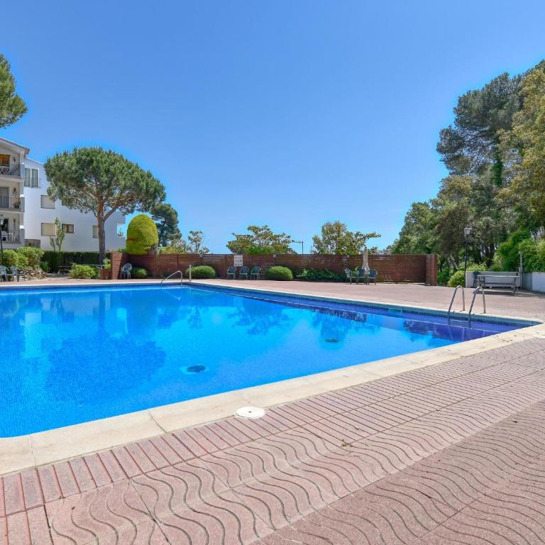 Baix amb terrassa jardí privada i accés a piscina - Apartamento - 14