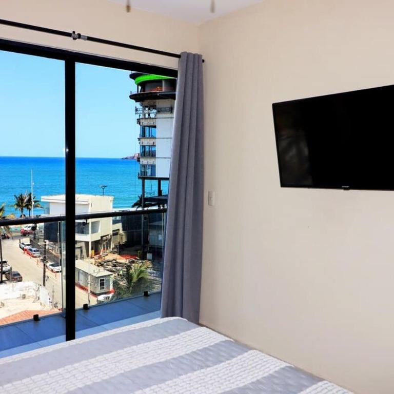 Departamento con 2 recámaras alberca y balcón frente al mar - Apartment - 2