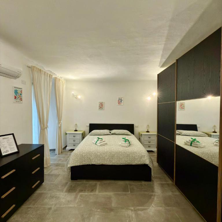 Caffaro Home - Appartamento con 2 Camere da Letto - 2