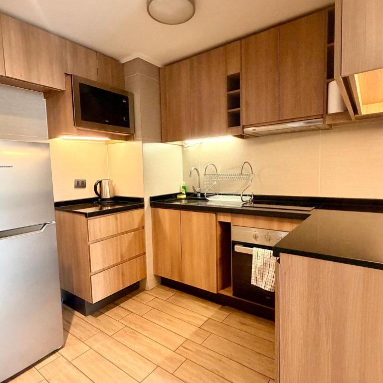 A pasos de Clinica - Parking - Cama King - Wifi - One-Bedroom Apartment - 19