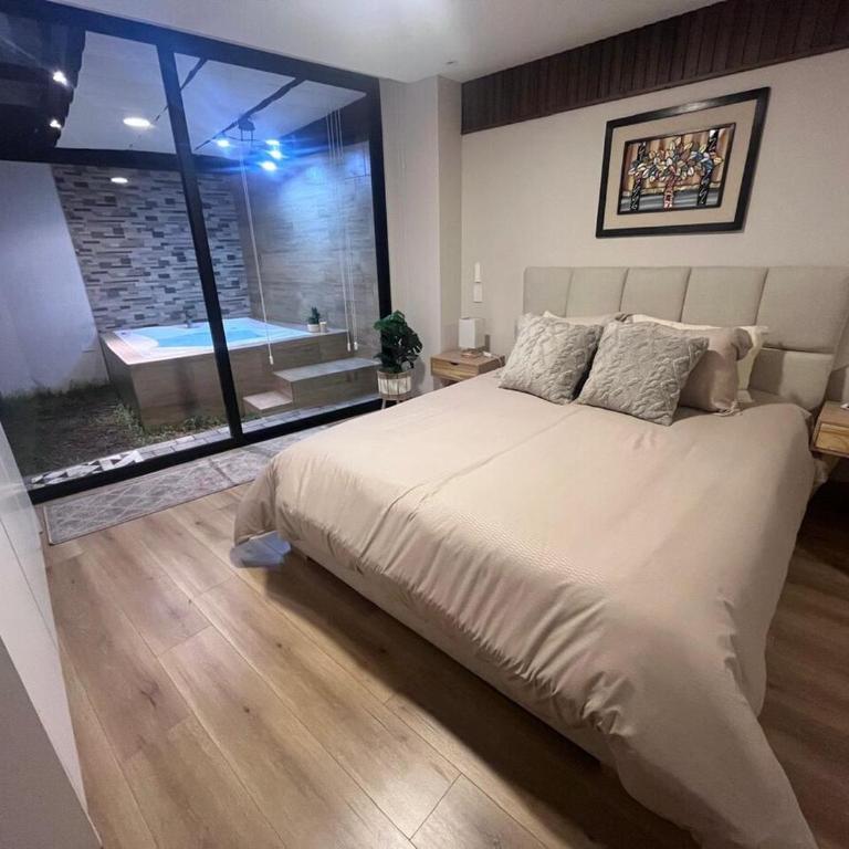 Alojamiento de Lujo con Jacuzzi y Jardín Privado - Two-Bedroom Apartment - 8