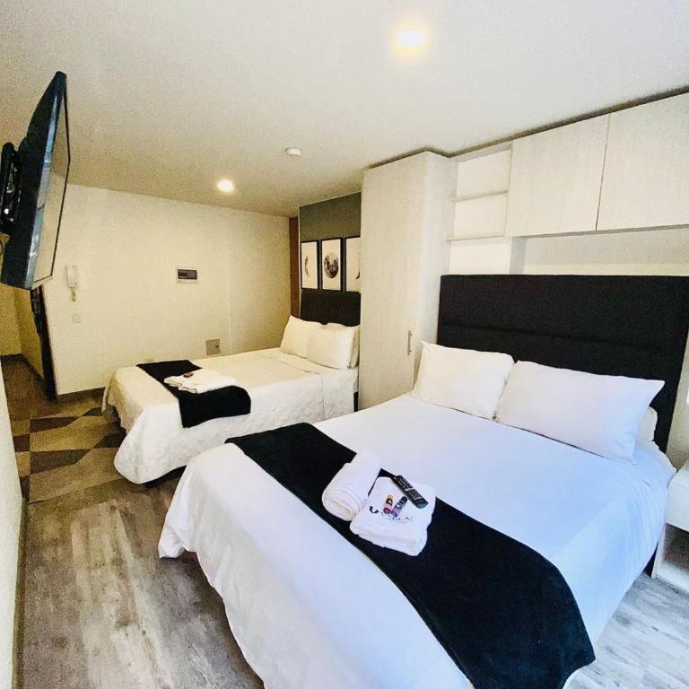 Varun Luxury Down Town Bogotá la Candelaria - Habitación con 2 camas grandes - 1