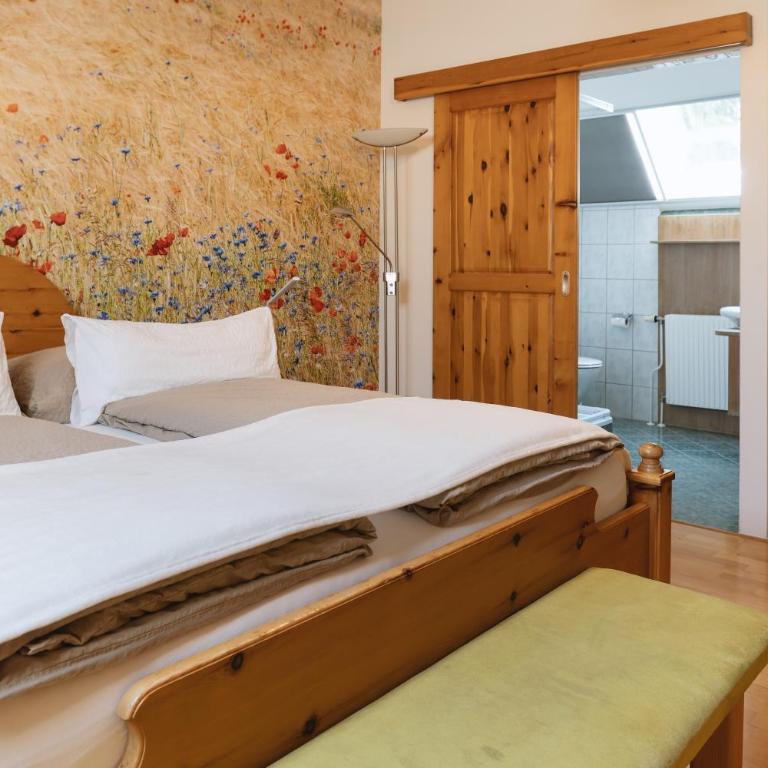 Landhaus Bender Ferienwohnung mit Terrasse und Garten - Apartment mit 1 Schlafzimmer und Balkon - 14