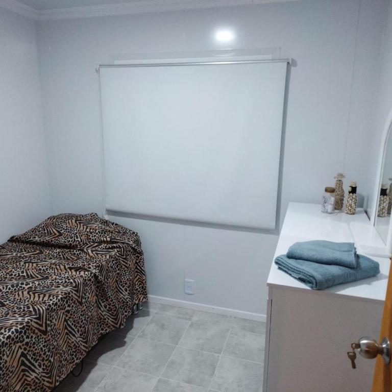 Casa con Barbacoa en ALtos de San Carlos Colonia del Sacramento - Three-Bedroom House - 5