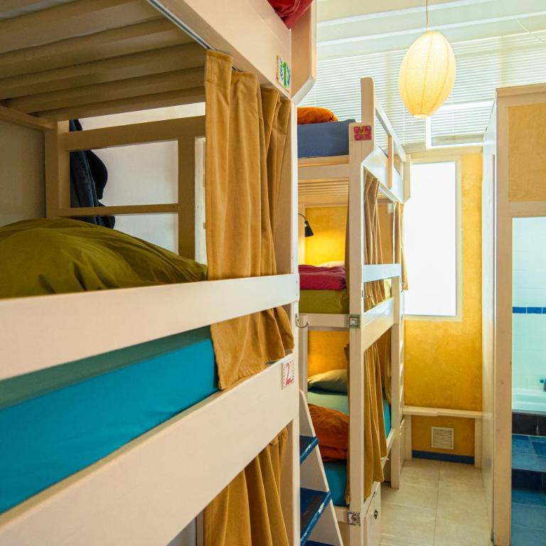 Casa Caracol - Cama en habitación compartida para mujeres de 7 camas con baño privado - 11