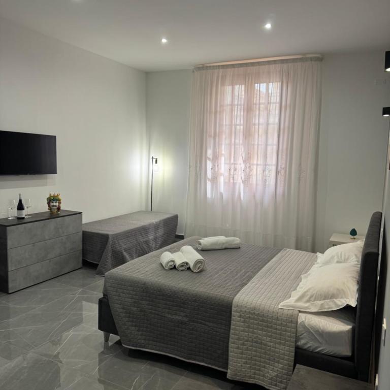 Antonella Rooms - Camera Tripla - 13