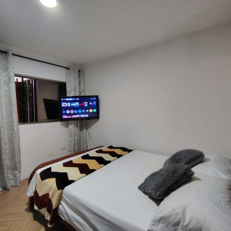Casa Hévenie, Amplia, familiar, cómoda y bien ubicada - Casa Unifamiliar de 3 dormitorios - 38
