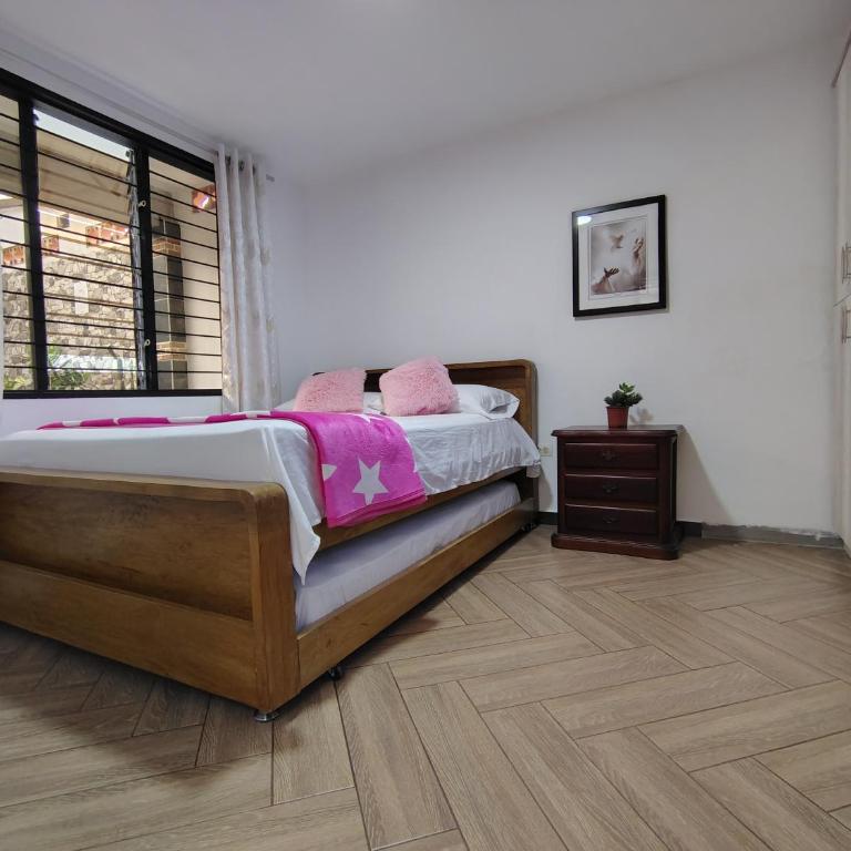 Casa Hévenie, Amplia, familiar, cómoda y bien ubicada - Casa Unifamiliar de 3 dormitorios - 44