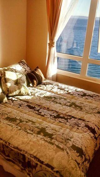 Departamentos Playa Bellavista Tome 2026 - Two-Bedroom Chalet - 9