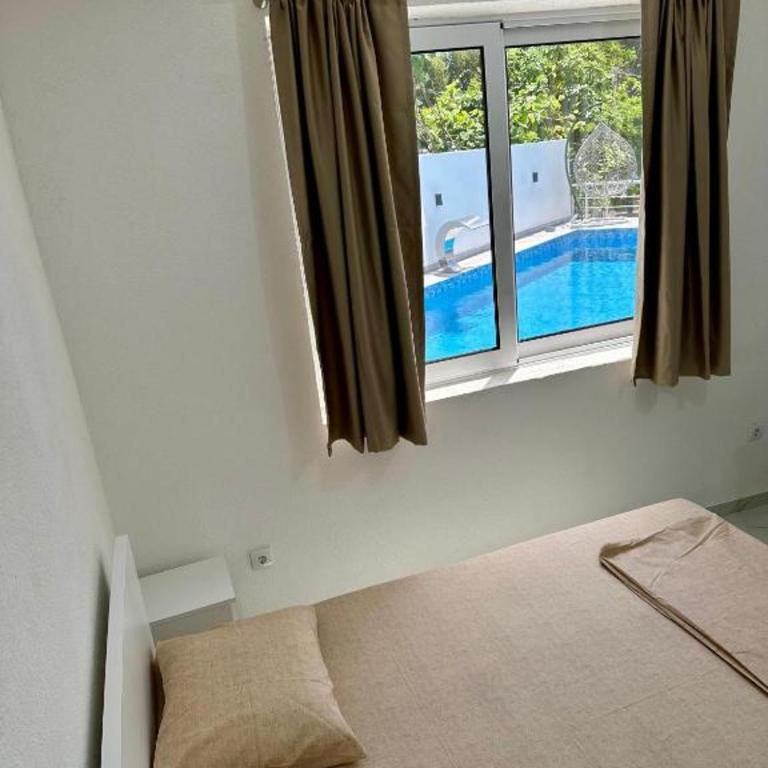 Dilans apartments by the sea - Studio with Pool View - 2