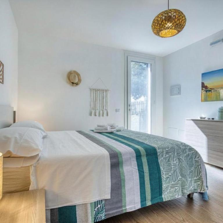 VFH Residence Flavia -Tre Piscine - Appartamento con 2 Camere da Letto, Terrazza e Vista Mare - 5