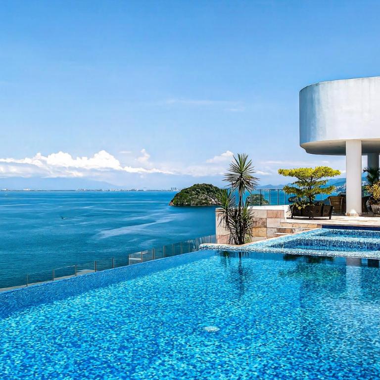 Modern condo with ocean views, rooftop infinity pool & central AC - Casa - 32