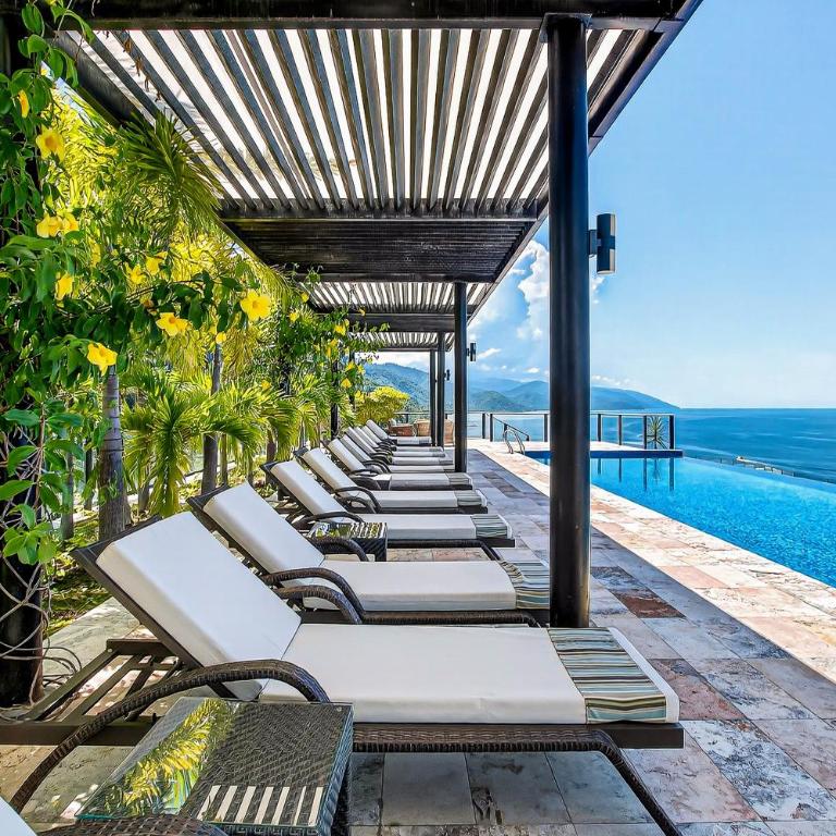 Modern condo with ocean views, rooftop infinity pool & central AC - Casa - 26