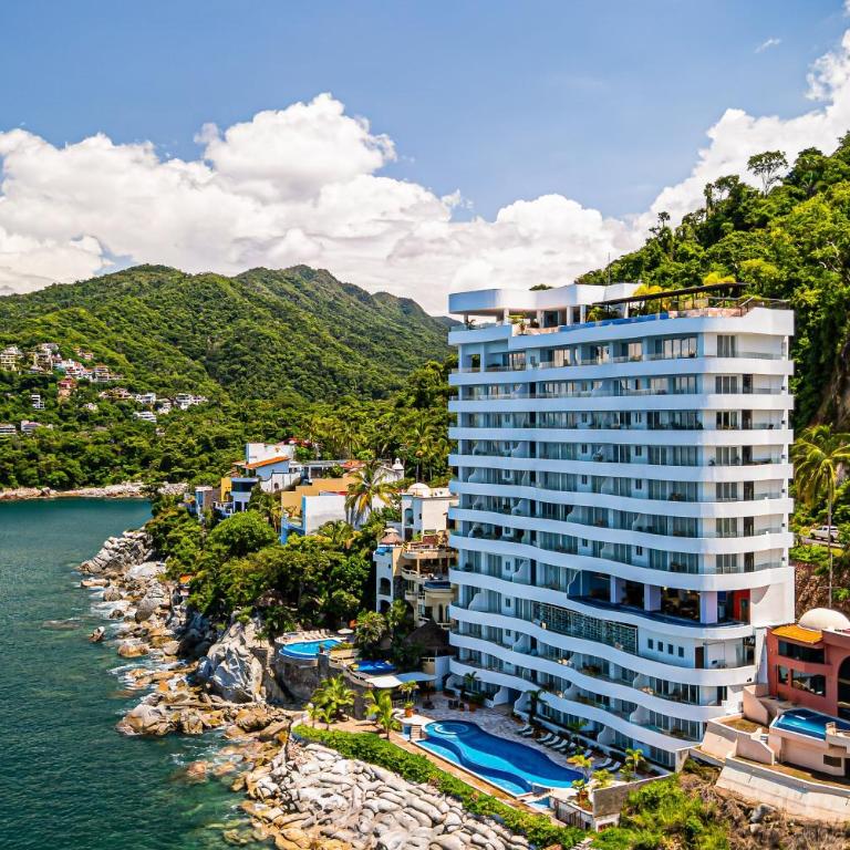 Modern condo with ocean views, rooftop infinity pool & central AC - Casa - 44