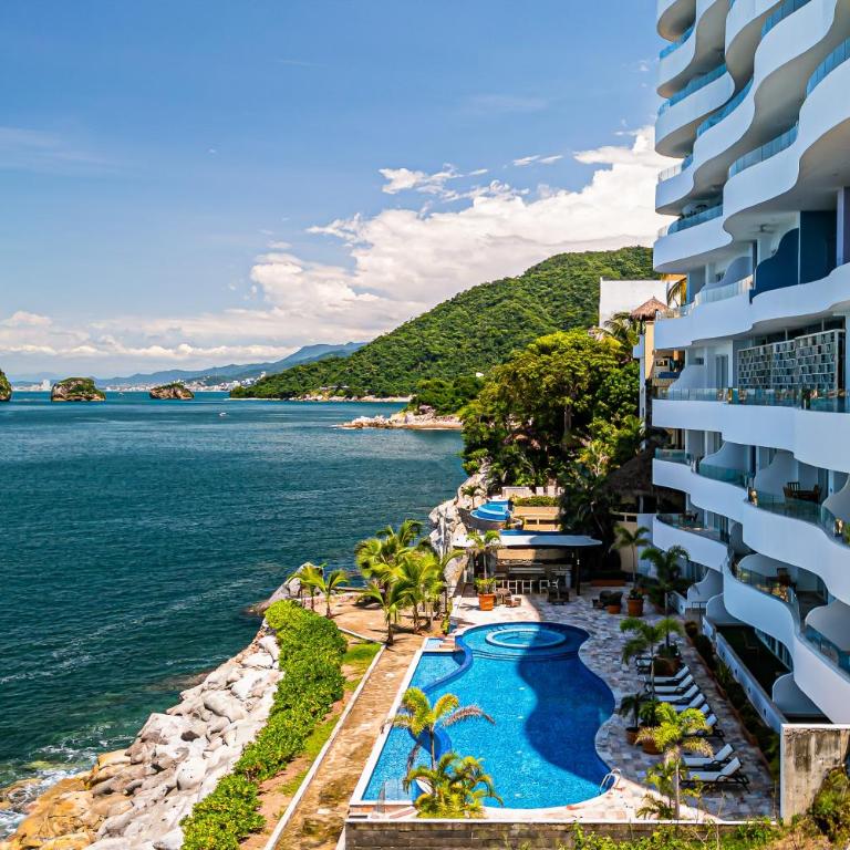 Modern condo with ocean views, rooftop infinity pool & central AC - Casa - 1