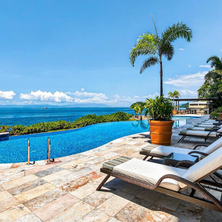 Modern condo with ocean views, rooftop infinity pool & central AC - Casa - 34