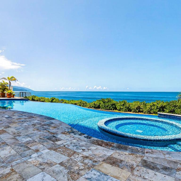 Modern condo with ocean views, rooftop infinity pool & central AC - Casa - 36