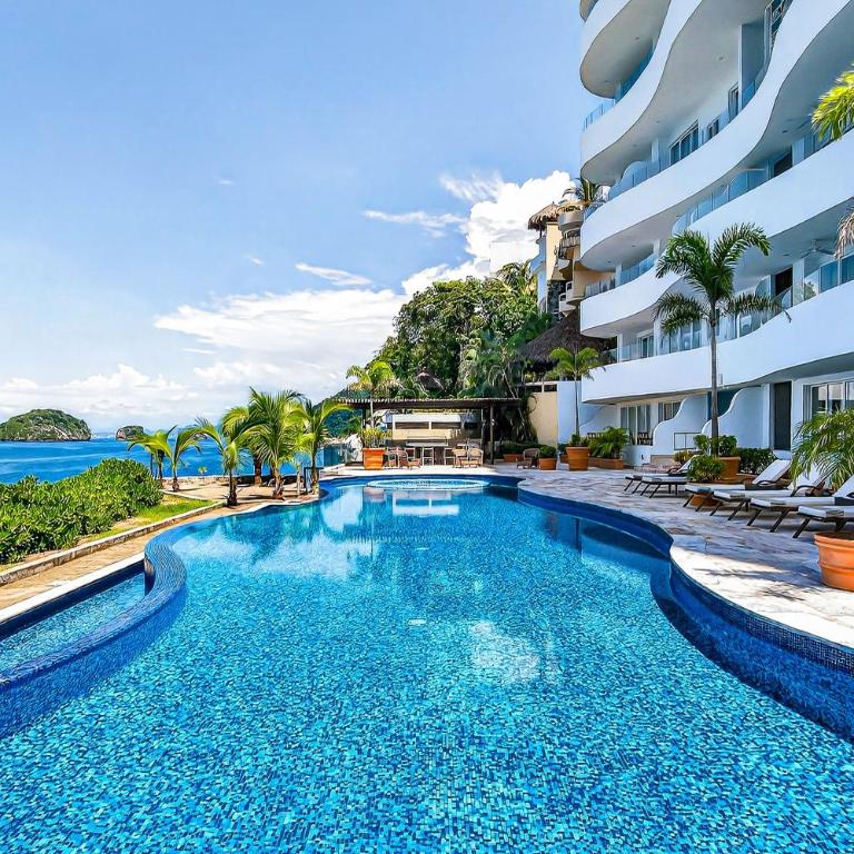 Modern condo with ocean views, rooftop infinity pool & central AC - Casa - 2