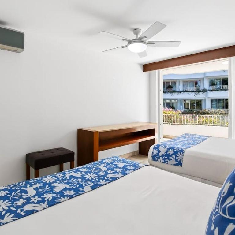 Luxurious partial ocean-view suite with 3 pools, hot tub, gym & balcony - Vacation Home - 16