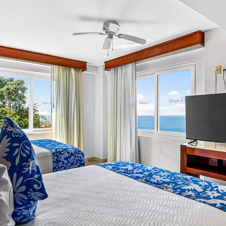 Partial ocean-view suite with 3 pools, hot tub, spa & balcony - Vacation Home - 12