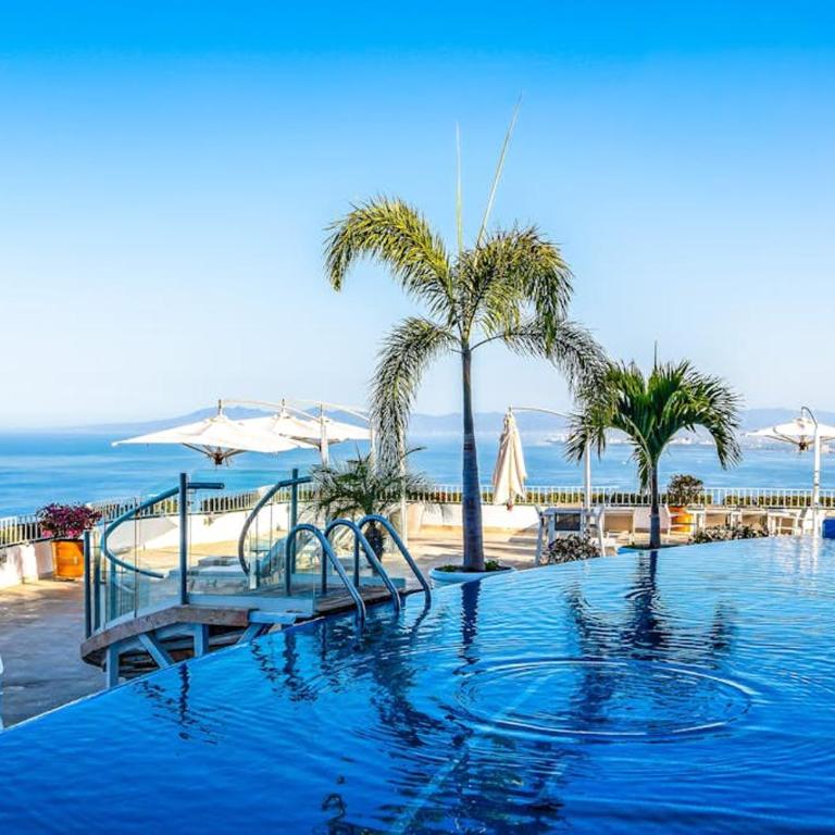 Partial ocean-view suite with 3 pools, hot tub, spa & balcony - Vacation Home - 42