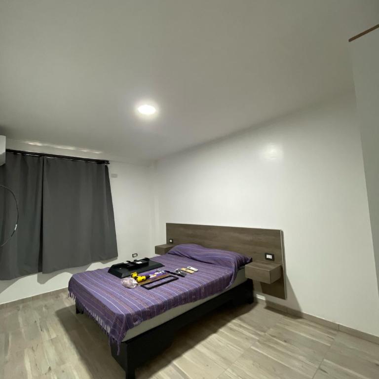 YOJU aparthotel - Habitación Cuádruple Prémium - 8