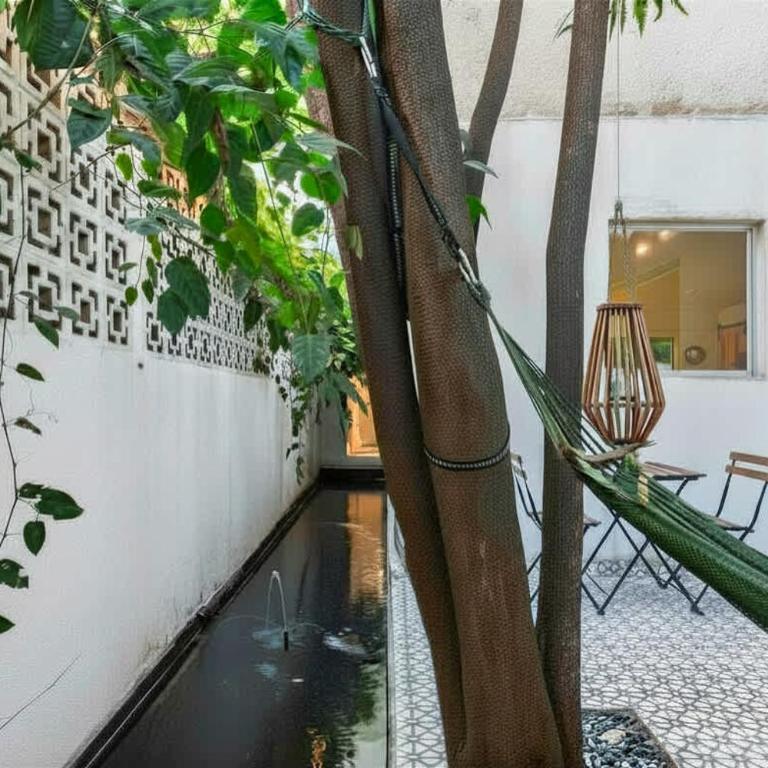 Private Oasis - Jacuzzi - Hammock - Water Feature - Two-Bedroom Deluxe Apartment with Garden View - 7