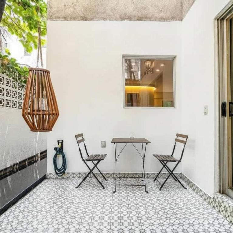 Private Oasis - Jacuzzi - Hammock - Water Feature - Two-Bedroom Deluxe Apartment with Garden View - 8