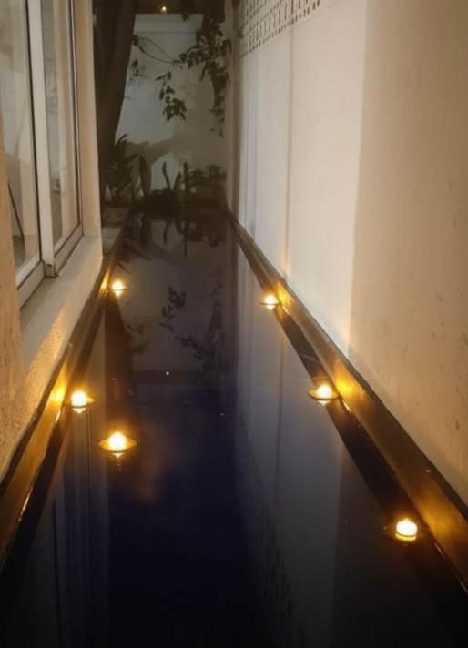 Private Oasis - Jacuzzi - Hammock - Water Feature - Two-Bedroom Deluxe Apartment with Garden View - 27