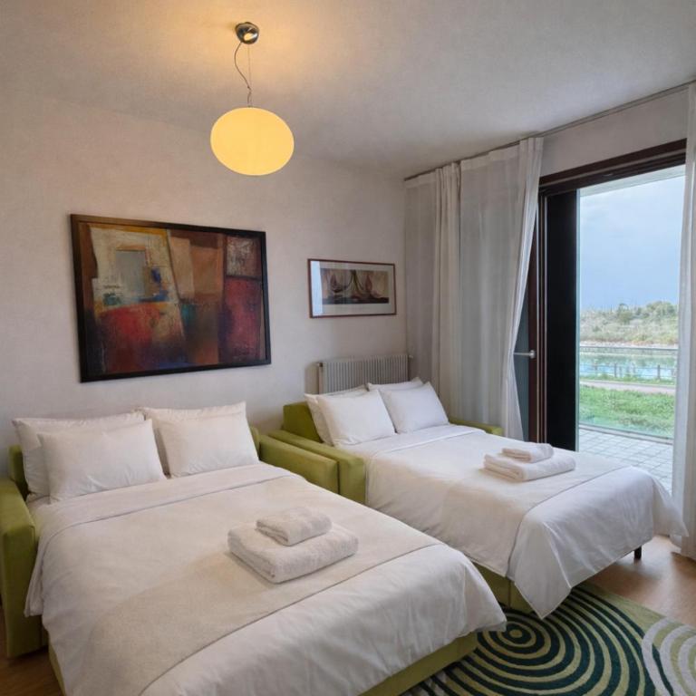Villaggio Parco Laguna - Appartamento con Piscina e Posto Barca - Appartamento con 1 Camera da Letto e Vista Piscina - 11