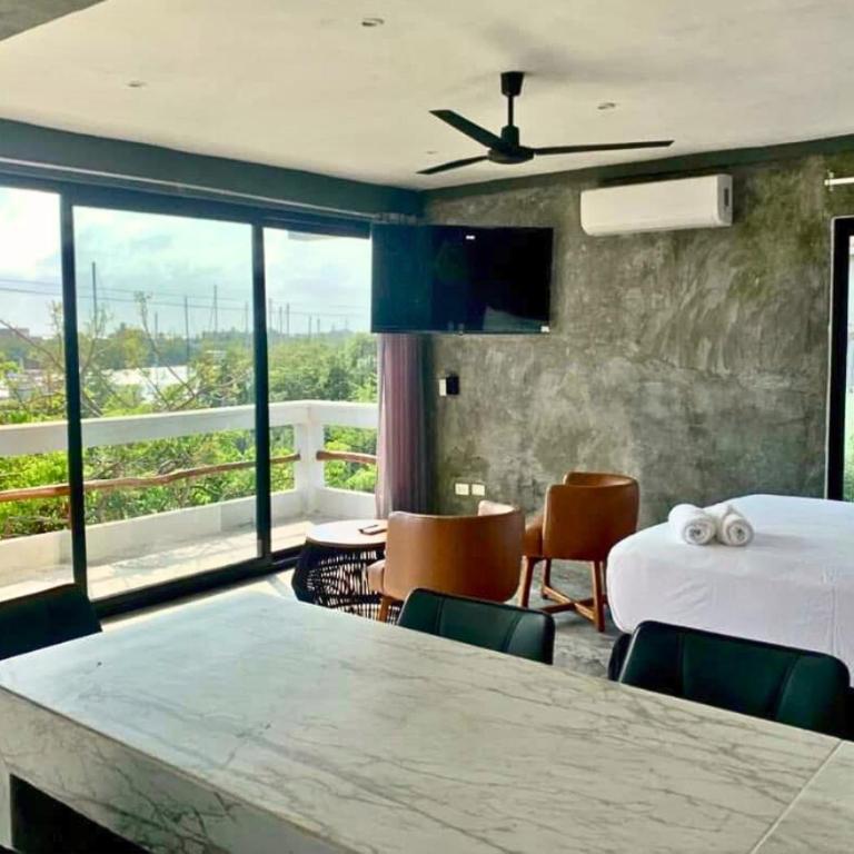 Rico Isla Rooms Eco-Chic - Deluxe Suite with Sea View - 7