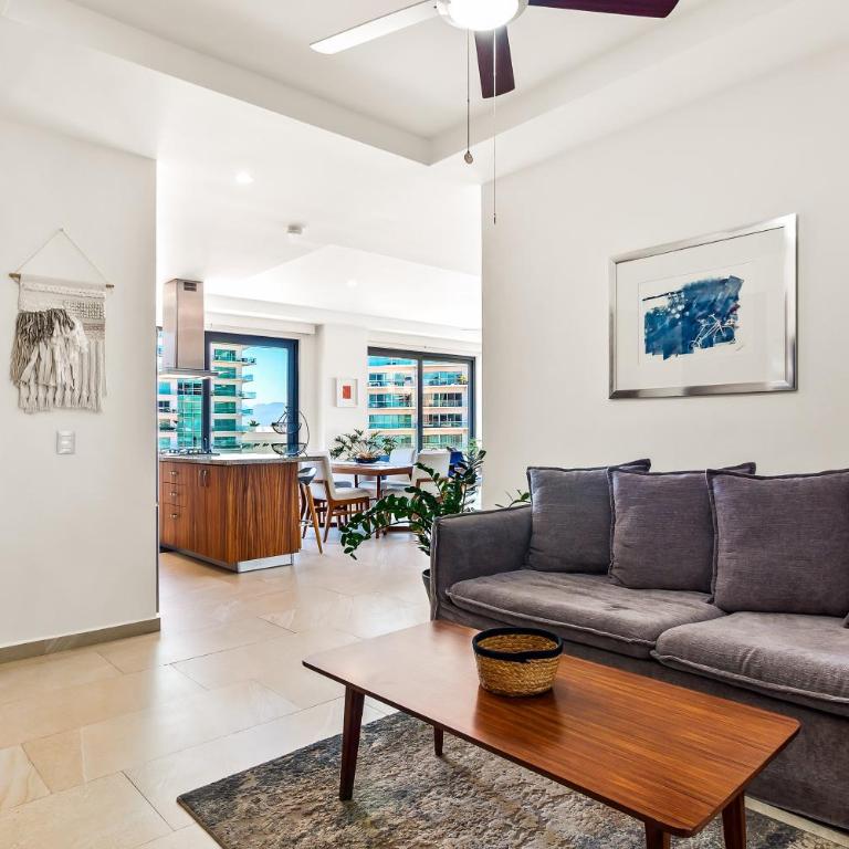 5th-floor condo with partial ocean views, heated pool, sauna, gym, balcony, W/D - Vacation Home - 9