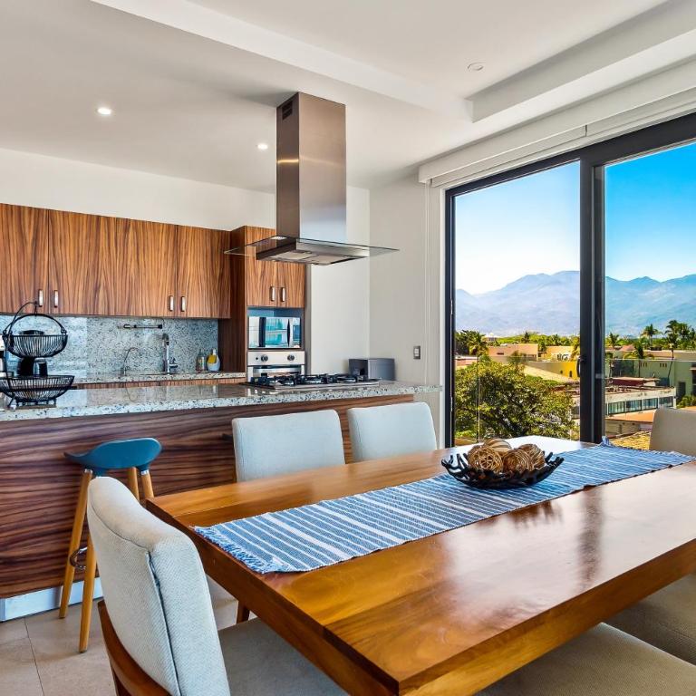 5th-floor condo with partial ocean views, heated pool, sauna, gym, balcony, W/D - Vacation Home - 13
