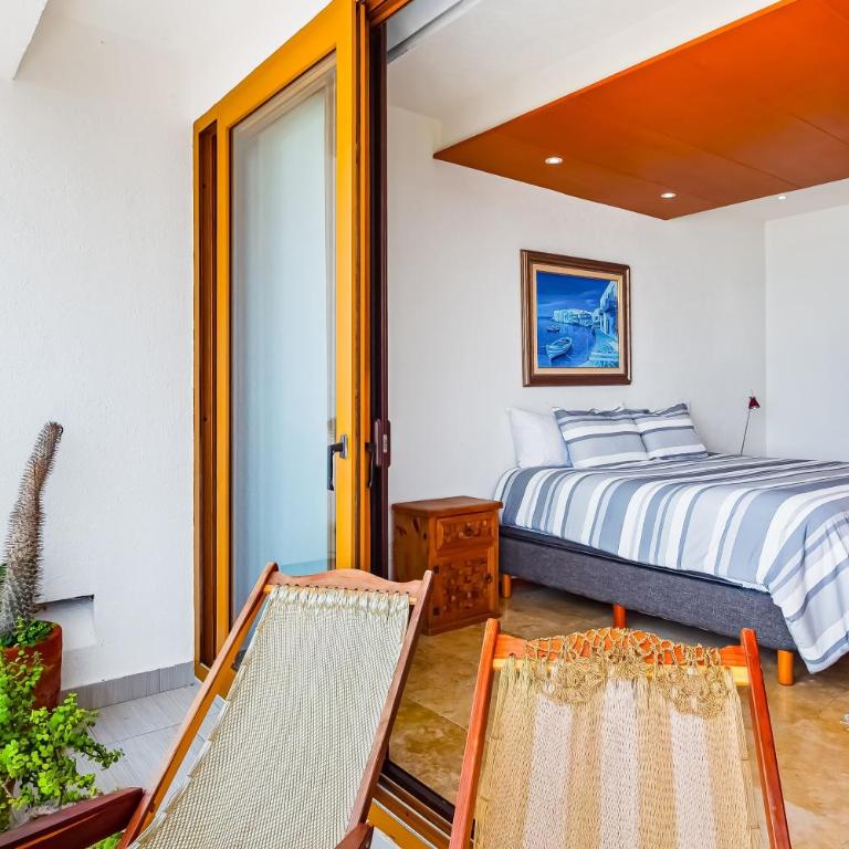 Beachfront 4th-floor condo with views, outdoor pool, balcony, W/D & central AC - Casa - 23
