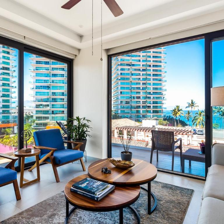 5th-floor condo with partial ocean views, heated pool, sauna, gym, balcony, W/D - Vacation Home - 8