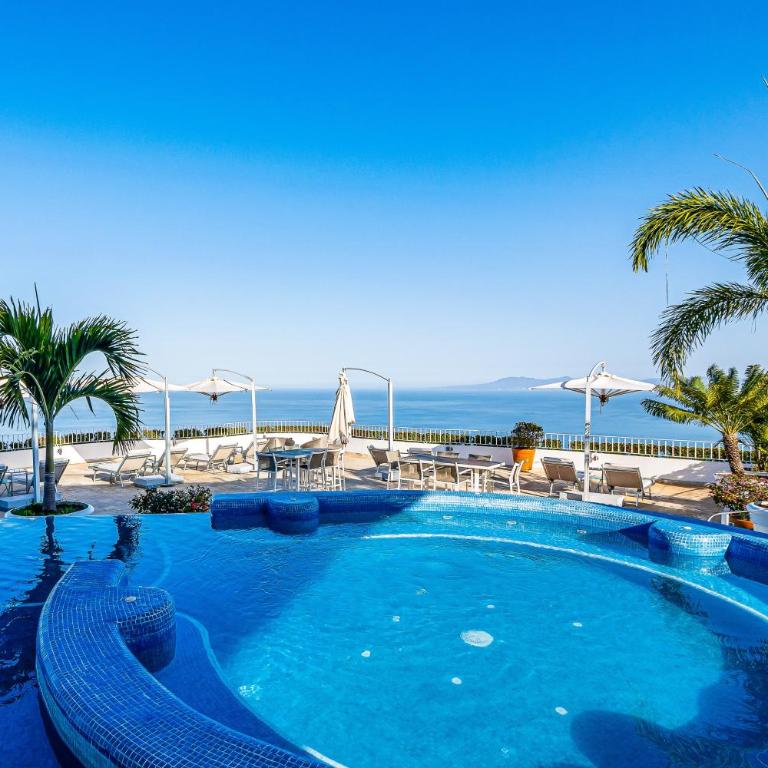 Upscale bayview villa with hot tub, private terrace, pool & stylish interiors - Vacation Home - 53