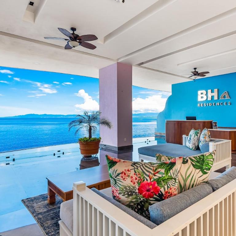 Oceanfront condo with rooftop infinity pool, panoramic views, balcony, gym, & AC - Vacation Home - 20