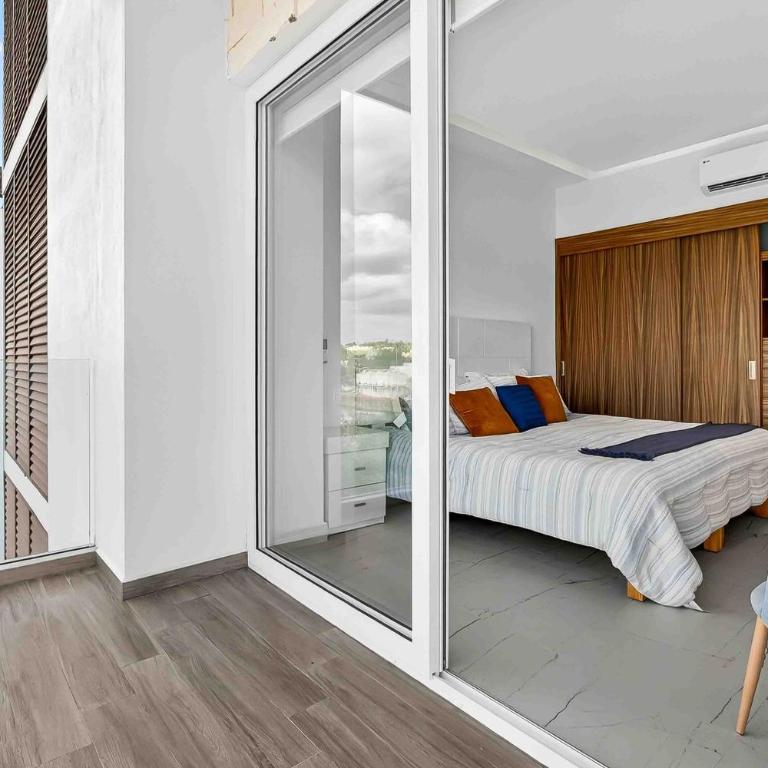 Relaxing condo with rooftop pool, oceanview balcony & walkable beach access - Casa - 19