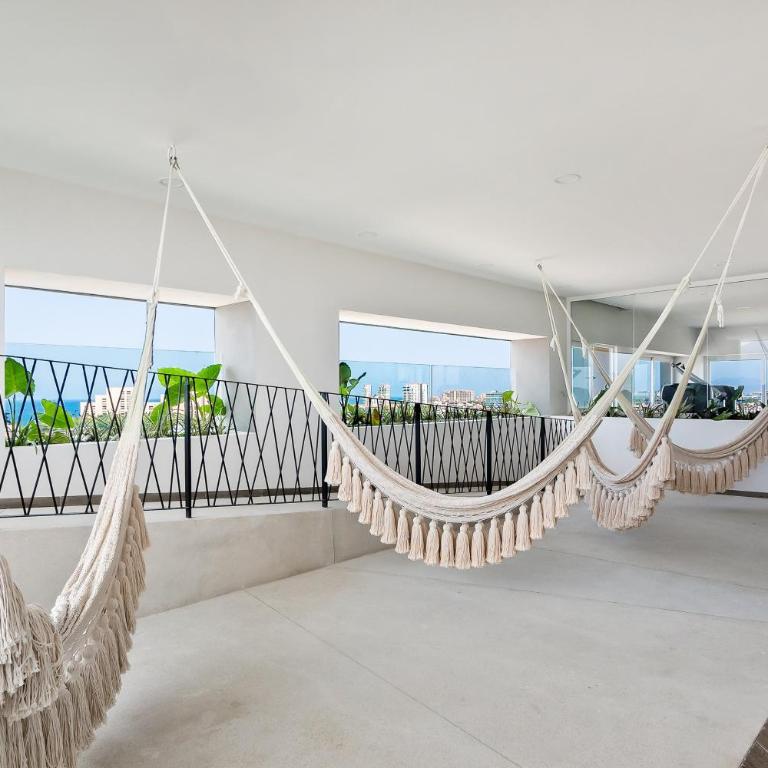 Resort condo with balcony, views, rooftop pool, gym, & full kitchen - Vacation Home - 17