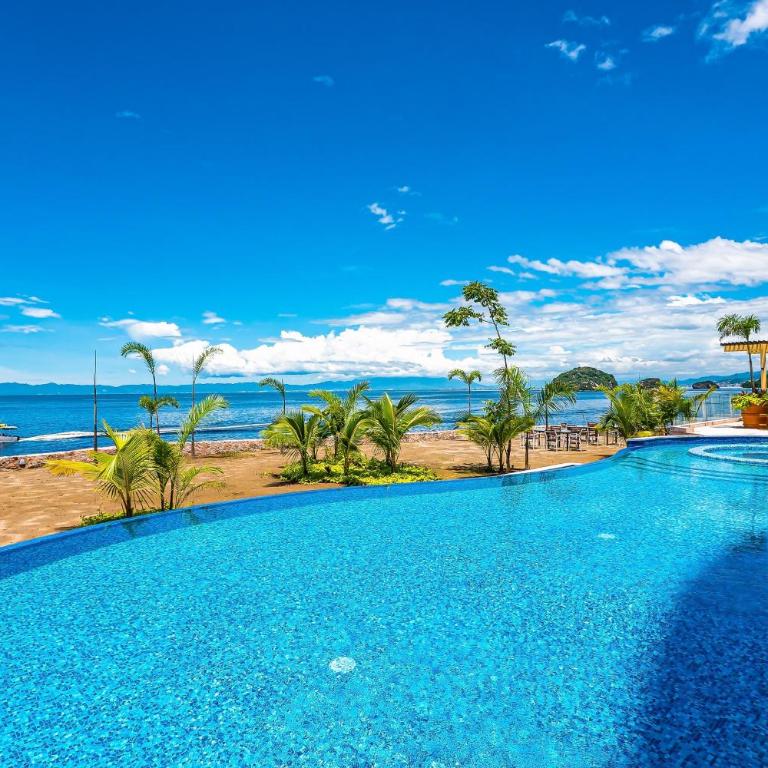 Luxurious 6th-floor condo with pool, oceanfront balcony & water view - Casa - 58