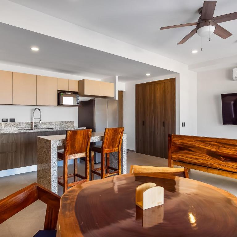 Resort condo with balcony, views, rooftop pool, gym, & full kitchen - Vacation Home - 6