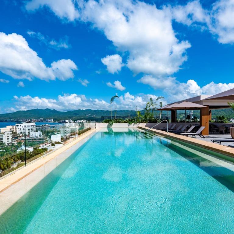 Modern waterfront condo with shared pool, balcony, and washer/dryer - Casa - 33