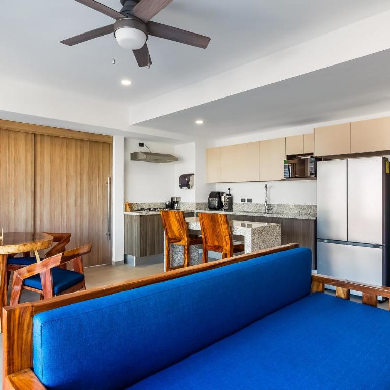 Resort condo with balcony, views, rooftop pool, gym, & full kitchen - Vacation Home - 4