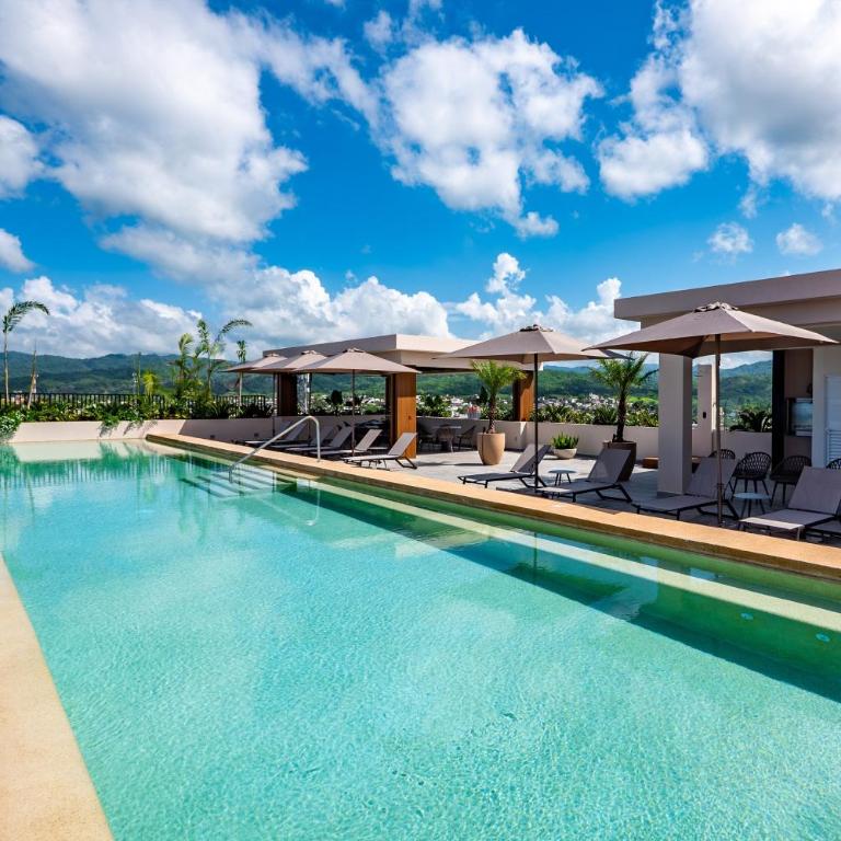 Modern waterfront condo with shared pool, balcony, and washer/dryer - Casa - 36