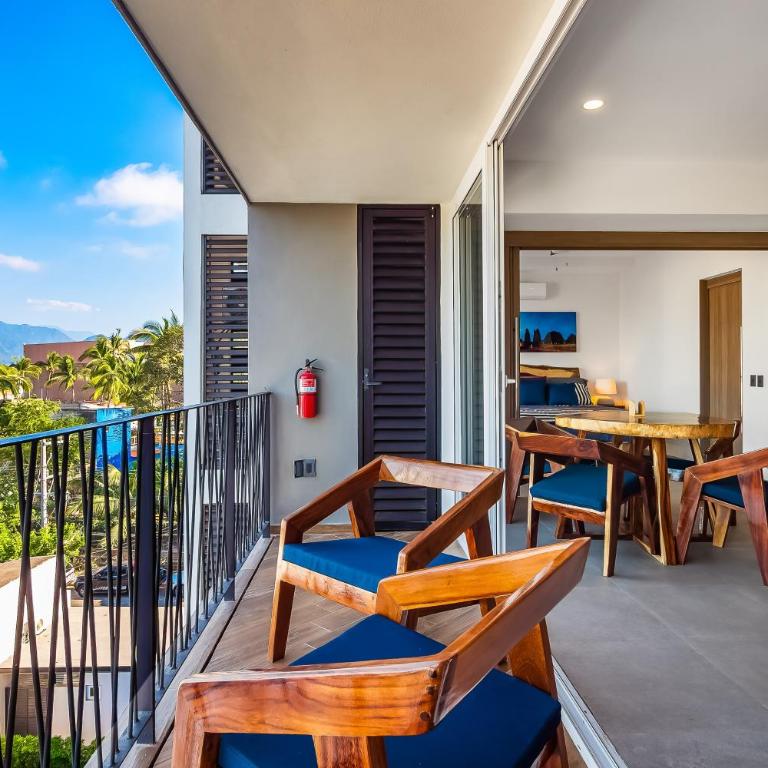 Resort condo with balcony, views, rooftop pool, gym, & full kitchen - Vacation Home - 20