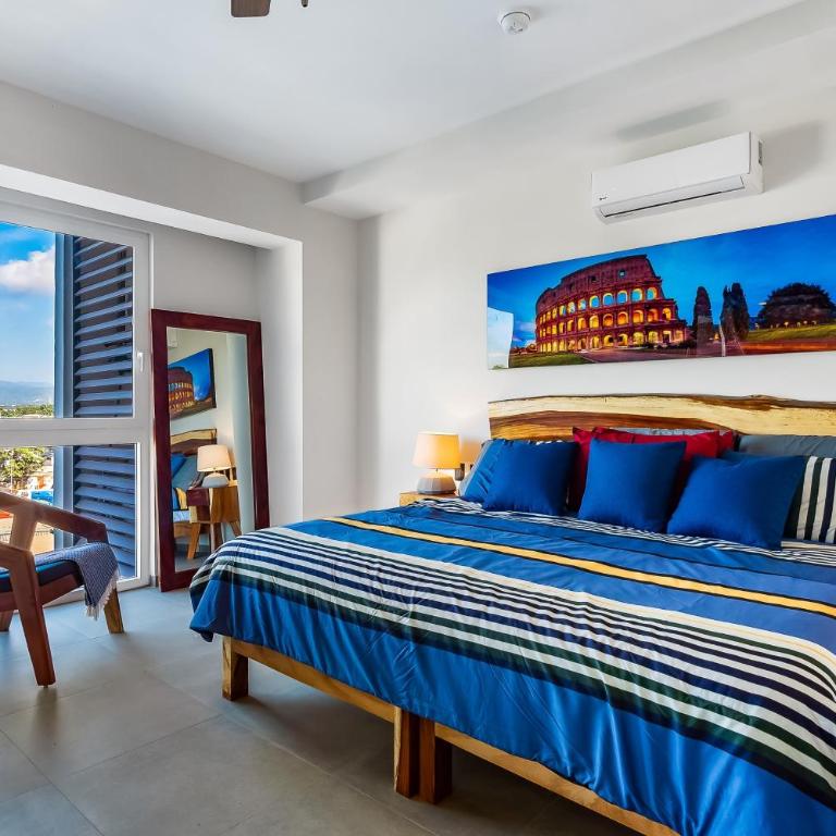 Resort condo with balcony, views, rooftop pool, gym, & full kitchen - Vacation Home - 12