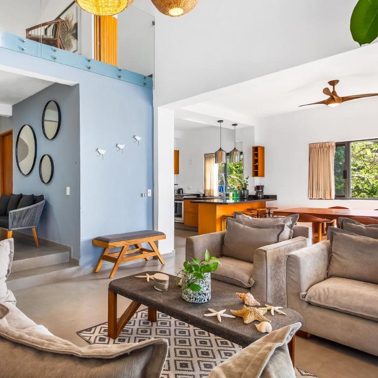 Bright ocean-view 2-story condo near beach with pool, balcony & full kitchen - Vacation Home - 12