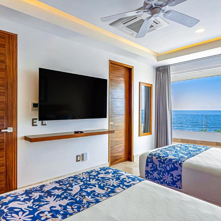 Luxe 2nd-floor condo with endless ocean views, pool, spa & balcony - Casa - 12