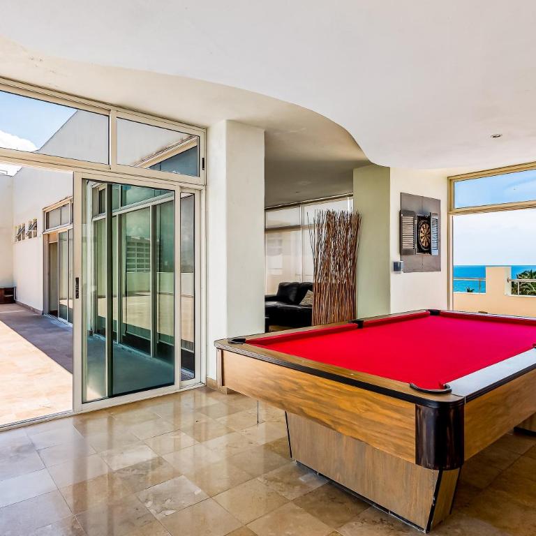 Spacious condo with near the beach with resort-style pool, inviting balcony - Casa - 32